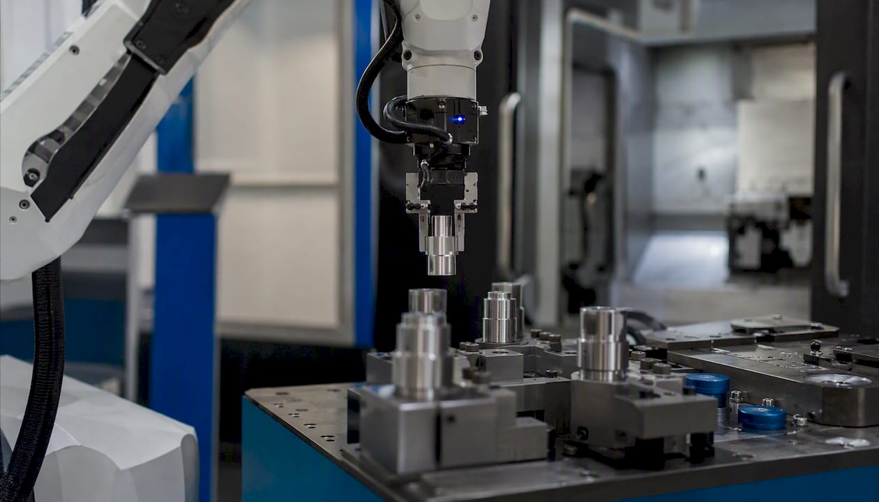 Robotic loader tending CNC machining parts